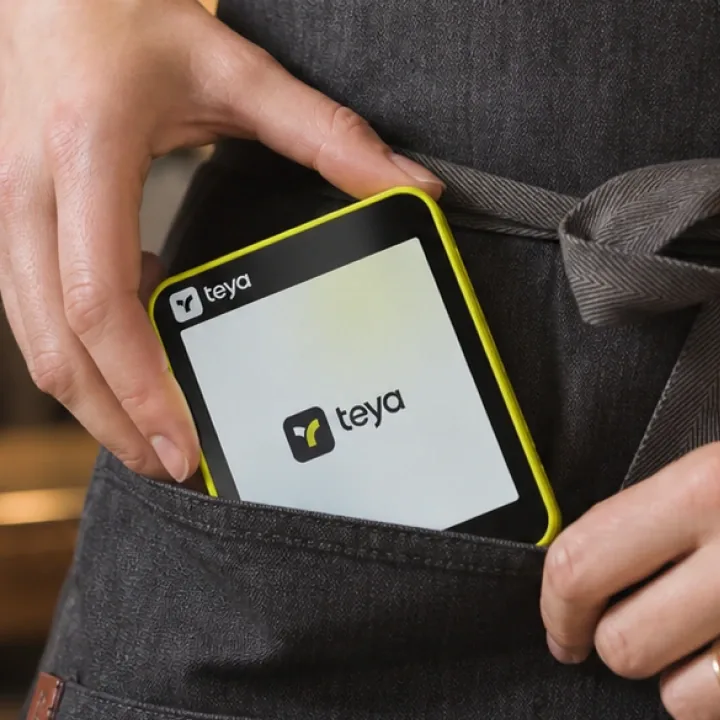 Teya card machine ready to take payment on a bar counter